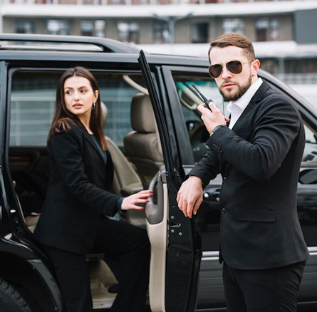 Private security guard escorting a person