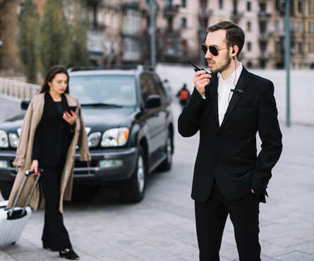 Private security guard communicating via a two-way radio