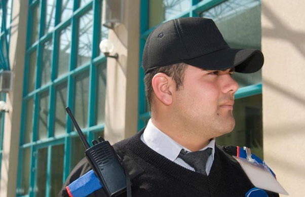 Security guard patrolling a commercial building